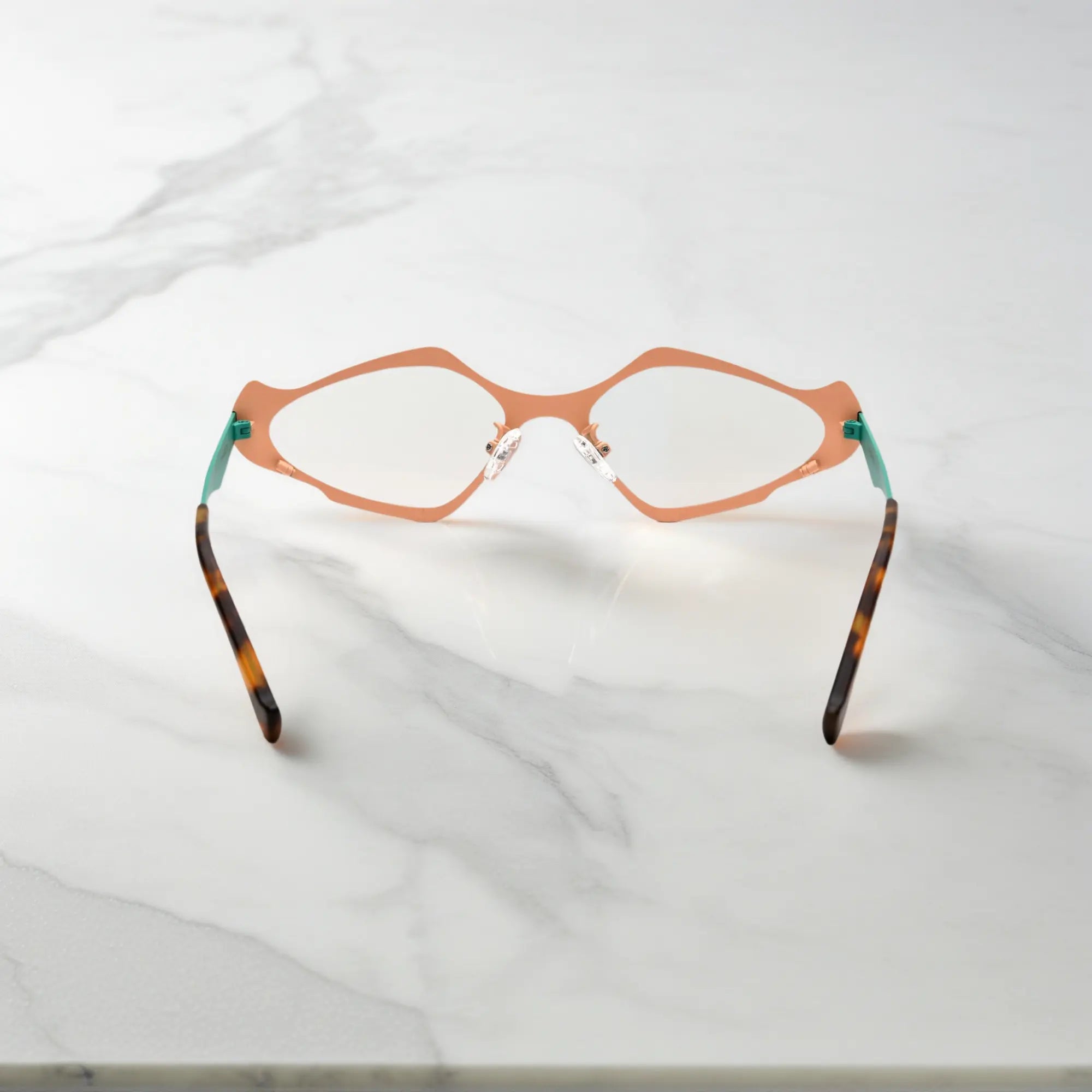 Back view showing temple structure of VoyueLens™ VL185811 in Coral Jade